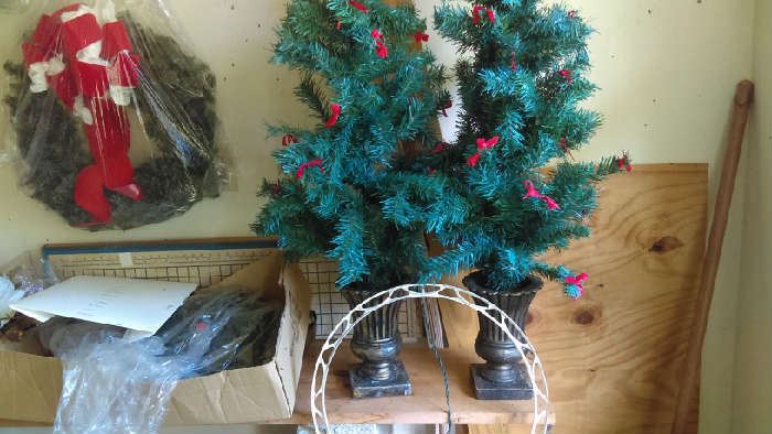prelit Christmas trees in urns $10 each