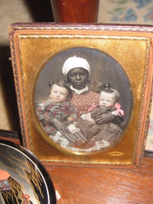 we will be taking sealed bids only on this hand tinted daguerreotype. it is 1/4 plate signed E. S. Dodge