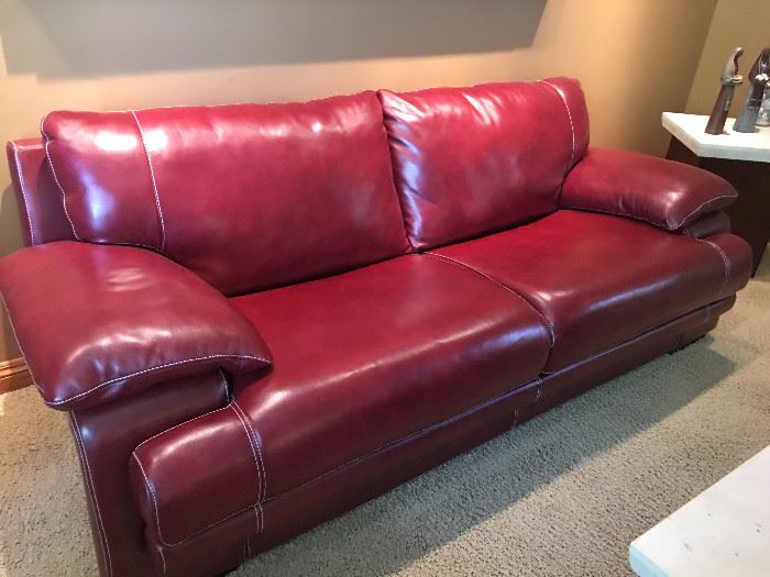 This leather couch and ottoman are in like new condition and just 2 years old!