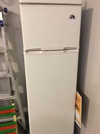 Igloo sleek fridge.  It's space saving size makes it perfect for your basement, bar or garage