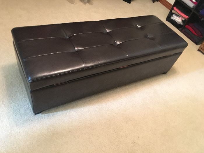 This leather bench has plenty of storage