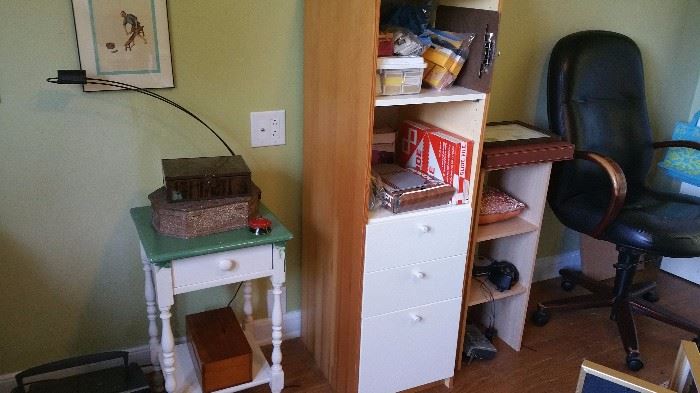 cute vintage side table...office storage cabinets...office chair...office supplies...vintage 35mm slides, back to the 1950's...slide viewers