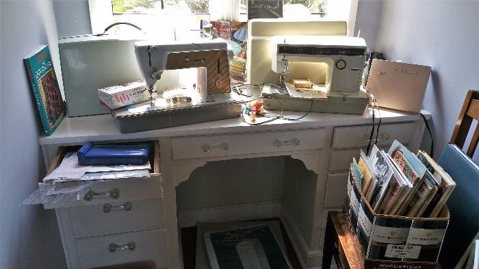 2 Sewing machines - 1 Kenmore, 1 singer (desk is built in)  Sewing and knitting books, crafting supplies