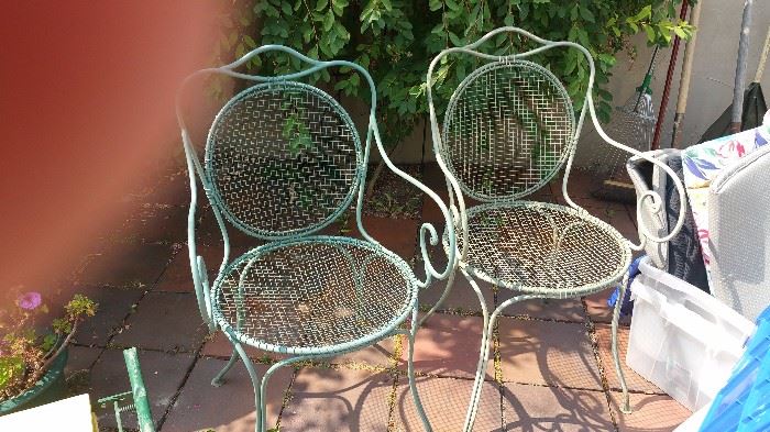 2 metal wire chairs.  thumb not for sale.