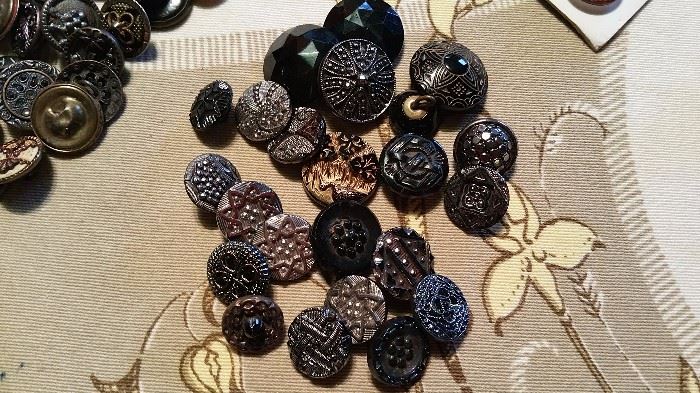 black glass buttons with silver and mica overlay