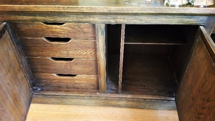 interior of one side of sideboard / credenza - the other side is shelves only