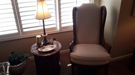 Wingback chair and small round end table