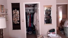 Asian art/wall mirror, lots and lots of clothes