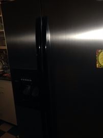 Whirlpool side-by-side stainless steel refrigerator