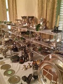 A variety of sterling and silver plate serving pieces