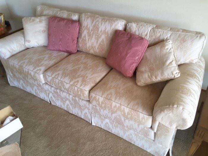 3 Seater Couch with 4 pillows.