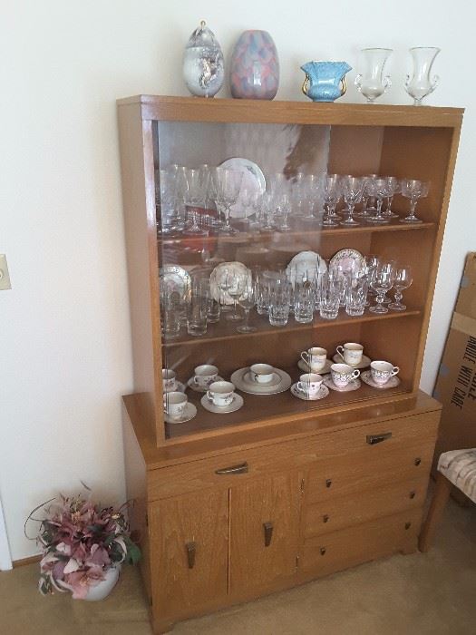 Danish Matching Breakfront to the Danish Dining Table, 3 shelves with glass windows. Collectible tea cups, stem ware, water glasses, wine glasses, champagne glasses. Crystal glasses. Plates, Vases.