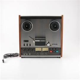 Vintage TEAC "A-3300SX" Reel-to-Reel Recorder: A vintage TEAC A-3300SX reel-to-reel recorder. The unit is comprised of stainless steel, metal, wood, and plastic components. The serial number is 308929. Made in Japan.