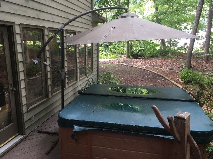 Umbrella for sale only.  (Hot Tub NOT for sale)