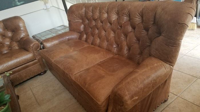 Leather 3 cushion Sofa, quality construction with brass studded arms and around base, distressed look but excellent condition of the leather- light and dark patches add to aged look