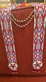 beaded ornament for over the shoulder, tassle in center back keeps it perfectly balanced
