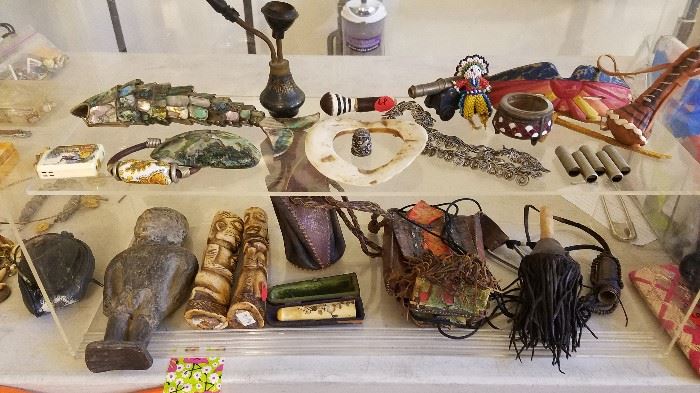 Small artifacts and treasures inc. abalone fish, leatherpouches, etc.