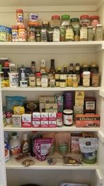 Pantry full of spices and seasonings, great cookbooks too