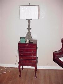 Silver chest on stand