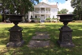 364a  Cast iron pair garden urns on stand, 5 ft. T.