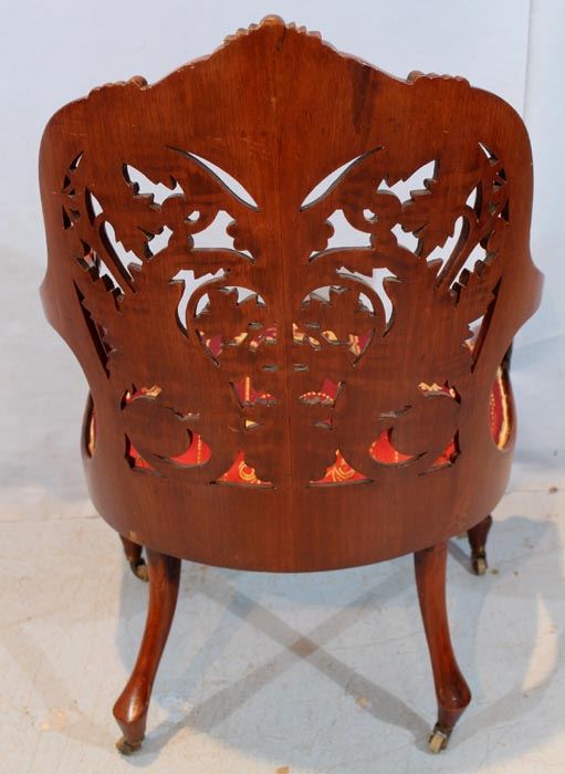 033c  Rosewood laminated pierce carved parlor chair attrib. to Springmeir, 39 in. T, 26 in. W, 20 in. D.
