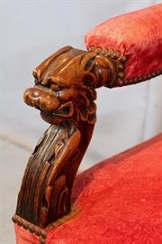 293d  Mahogany fireside chair with lions head on arms and turned finials, 43 in. T, 24 in. W, 20 in. D.