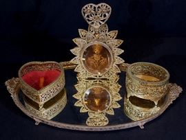 303a  French 4 piece dresser set with gold wash finish, 1.5 in. T, 19 in. W, 11 in. D.