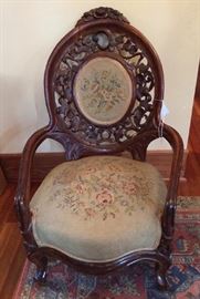 370a  Rosewood pierced carved parlor chair by Henkel, 38 in. T, 35 in. W.