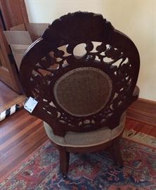 370b  Rosewood pierced carved parlor chair by Henkel, 38 in. T, 35 in. W.