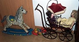 Paper mache rocking horse and Victorian doll buggy - both are reproductions