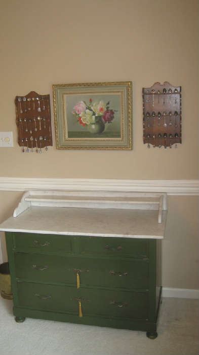 Marble top side board with raised shelf and drawers, painting, souvenir spoons on racks