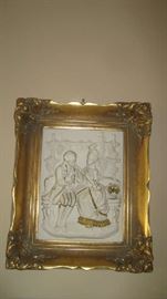 One of a pair of gold gilt framed Dresden bisque wall plaques  