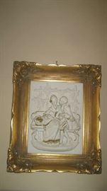 One of a pair of Dresden bisque wall plaques