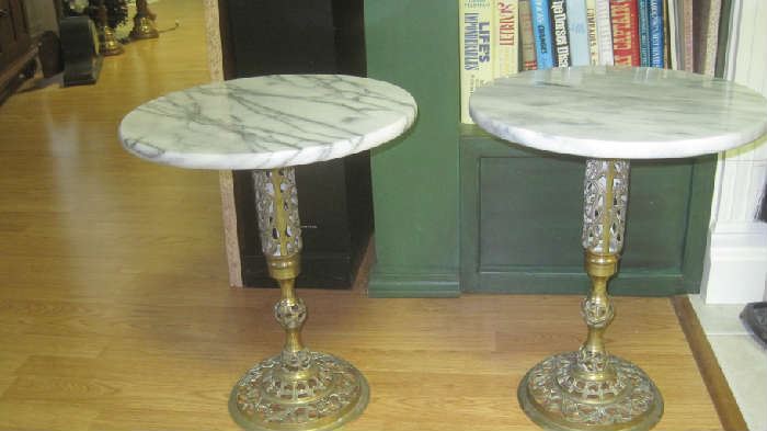 Pair of round marble accent tables on ornate brass pedestal bases