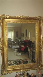 Gold gilt framed wall mirror purchased in the 1950s in Europe