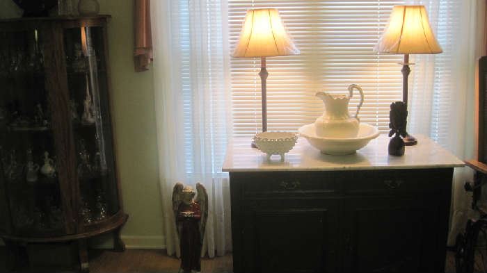 Marble top chest with lamps, bowl & pitcher 