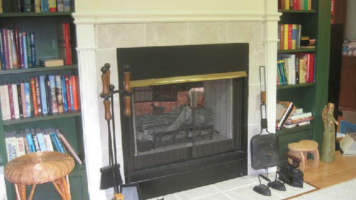 Fireplace set, vintage popcorn popper, antique cast iron coal heated clothes iron, variety of books 