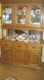 Lighted china hutch with crystal/glassware, milk glass
