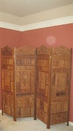 Four panel wooden privacy screen purchased in Europe