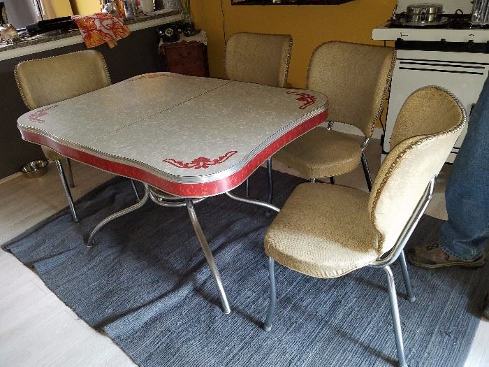 Retro Vintage Table and chairs, perfect condition, leaf underneath, rare shape and color.