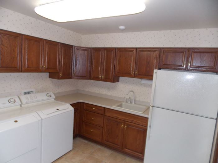 washer and gas dryer refrigerator oak kitchen cabinets