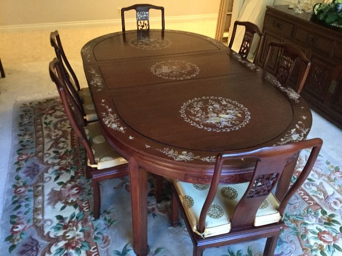 Rosewood Dining Table w/Pearl Inlay, measures 78" x 44" without the additional leaf which adds 18".  Table has 8 chairs.