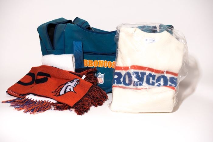 Broncos sweater, duffel bag and scarfs