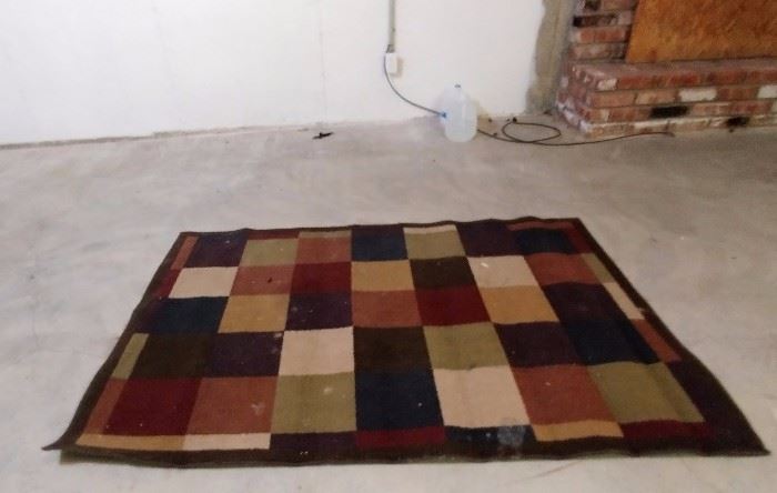 smaller area rug     BASEMENT