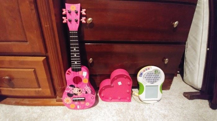 Minnie guitar, light-up heart, and Leap Pad     KIDS BEDROOM