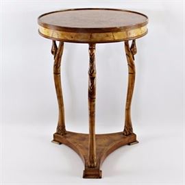 Italian Side Table: An Italian side table. This burl wood table features a circular surface that rests on three arched swan legs and has a triangular base with flat, block feet. It has a sticker marked “Style N. 426 Made in Italy.”