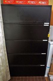Tall metal filing cabinet