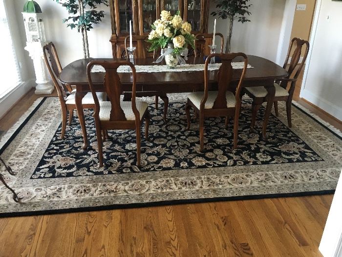 Dining room rug measures 152" by 109". No tags. Overall excellent condition. 