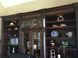 Absolutely gorgeous executive desk and office storage / display cabinet. Purchased 2 years ago from Furnitureland South for $7,000. 

Desk measures 36.5" deep by 30.5" tall by 74" wide. Storage on both sides.

Display cabinet measures  20.5" deep by 93" tall by 111" wide. Has shelving and a drawer on each section. Touch lighting for showcasing display items. 