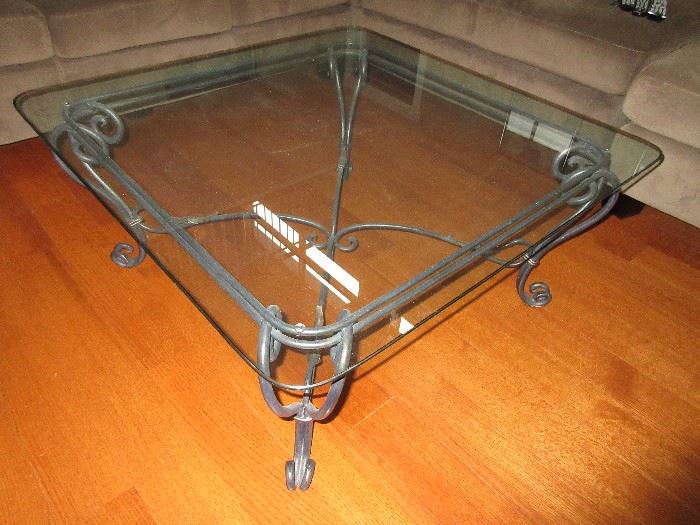 Glass and iron coffee table
